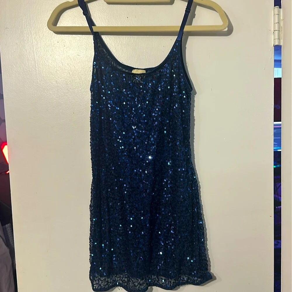 Woman’s Sequins spaghetti strap blue dress from Daytrip. Size L.